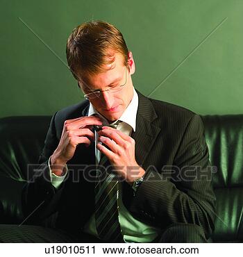 Stock Photography - men, occidental, 
male, smile, confident, 
salaried employee. 
fotosearch - search 
stock photos, 
pictures, images, 
and photo clipart