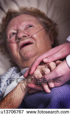 Picture - senior woman sick 
in bed. fotosearch 
- search stock 
photos, pictures, 
images, and photo 
clipart