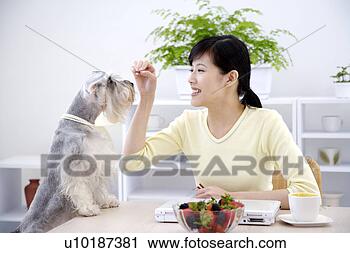 Stock Photography - female and pets, 
one person, one 
young woman only. 
fotosearch - search 
stock photos, 
pictures, images, 
and photo clipart