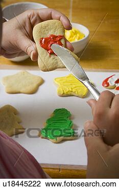 Banco de Imagem - mãe,  filha,  
decorando,  natal, 
 biscoitos. fotosearch 
- busca de fotos, 
imagens e clipart