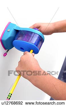 Banco de Imagem - menina,  afiando, 
 lápis. fotosearch 
- busca de fotos, 
imagens e clipart