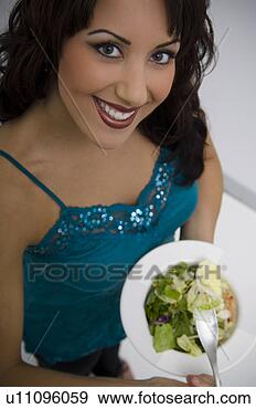 Arquivo Fotográficos - mulher,  comer, 
 salada. fotosearch 
- busca de fotos, 
imagens e clipart