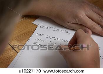 Arquivo de Fotografias - menino,  escrita, 
 letra,  santa. 
fotosearch - busca 
de fotos, imagens 
e clipart