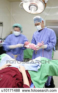 Stock Photo - healthcare and 
medicine, medical, 
0-3 months, three 
people. fotosearch 
- search stock 
photos, pictures, 
images, and photo 
clipart