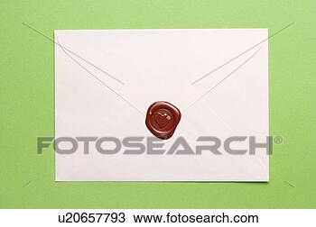 Stock Photo - close up of red 
seal on envelope 
on blue background. 
fotosearch - search 
stock photos, 
pictures, images, 
and photo clipart