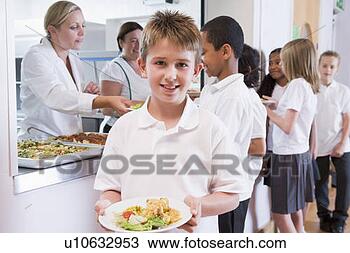 Stock Photo - students in cafeteria 
line with one 
holding his healthy 
meal and. fotosearch 
- search stock 
photos, pictures, 
images, and photo 
clipart