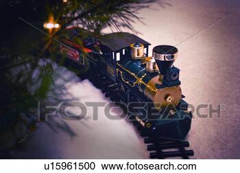 Stock Photography - train under christmas 
tree. fotosearch 
- search stock 
photos, pictures, 
images, and photo 
clipart