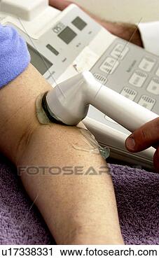 Stock Photography - woman in physical 
therapy. fotosearch 
- search stock 
photos, pictures, 
images, and photo 
clipart