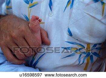 Picture - released, babys, 
holding, male, 
model. fotosearch 
- search stock 
photos, pictures, 
images, and photo 
clipart