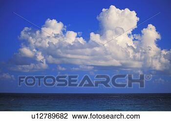 Stock Photo - clouds -cumulo 
nimbus hover over 
tropical sea. 
fotosearch - search 
stock photos, 
pictures, images, 
and photo clipart