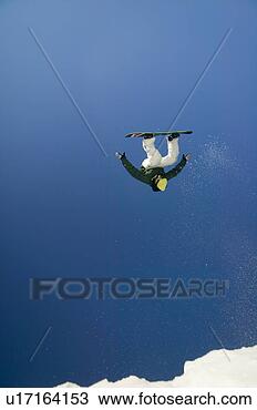 Stock Photo - inverted competitor 
at slopeside competition 
up at mt washington. 
fotosearch - search 
stock photos, 
pictures, images, 
and photo clipart