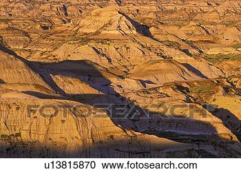 Stock Photography - sandstone hills 
carved from melting 
ice water from 
the last ice age. 
fotosearch - search 
stock photos, 
pictures, images, 
and photo clipart