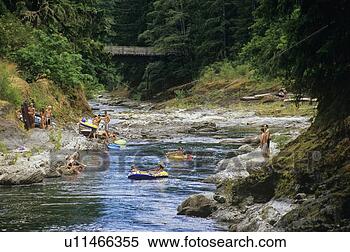 Stock Image - tubers on the 
cowichan river 
near skutz falls, 
 vancouver island. 
fotosearch - search 
stock photos, 
pictures, images, 
and photo clipart