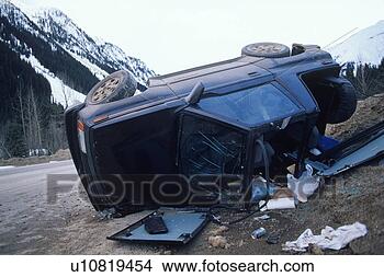 Stock Photo - rocky mountains 
- overturned suv 
on highway after 
accident,  british. 
fotosearch - search 
stock photos, 
pictures, images, 
and photo clipart