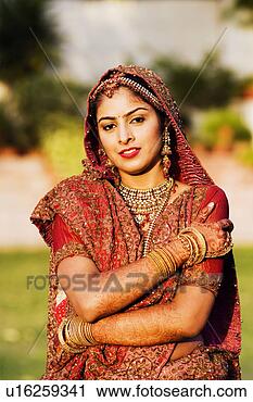 Stock Photography - portrait of a 
bride in a traditional 
wedding dress. 
fotosearch - search 
stock photos, 
pictures, images, 
and photo clipart