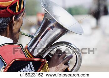 Stock Photo - rear view of a 
man playing the 
tuba, jaipur, 
rajasthan, india. 
fotosearch - search 
stock photos, 
pictures, images, 
and photo clipart