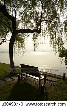 Stock Photography - bench at west 
lake park,  hangzhou, 
 zhejiang province, 
 people. fotosearch 
- search stock 
photos, pictures, 
images, and photo 
clipart