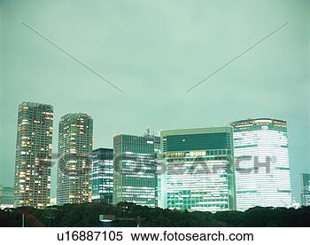 Stock Image - illuminated office 
buildings in shiodome, 
tokyo. fotosearch 
- search stock 
photos, pictures, 
images, and photo 
clipart