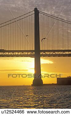 Stock Photo - sunrise on the 
bay bridge, san 
francisco. fotosearch 
- search stock 
photos, pictures, 
images, and photo 
clipart