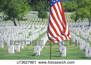 Stock Photography - american flag 
and rows of gravestones. 
fotosearch - search 
stock photos, 
pictures, images, 
and photo clipart