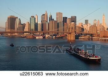 Stock Photo - ship sailing near 
the brooklyn bridge 
in new york city 
harbor,  new. 
fotosearch - search 
stock photos, 
pictures, images, 
and photo clipart