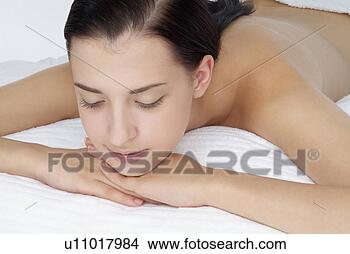 Stock Photo - close-up of a 
woman relaxing. 
fotosearch - search 
stock photos, 
pictures, images, 
and photo clipart