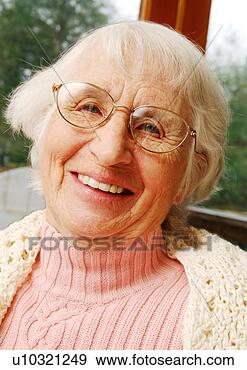 Stock Photograph - portrait of a 
cheerful elderly 
woman. fotosearch 
- search stock 
photos, pictures, 
images, and photo 
clipart