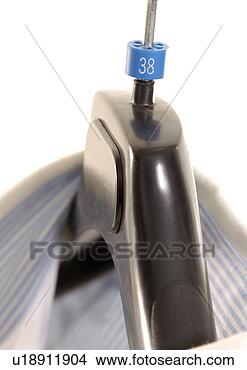 Stock Photo - close-up of a 
shirt on a hanger. 
fotosearch - search 
stock photos, 
pictures, images, 
and photo clipart