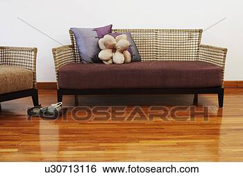 Stock Photo - couch and an armchair 
on a hardwood 
floor. fotosearch 
- search stock 
photos, pictures, 
images, and photo 
clipart