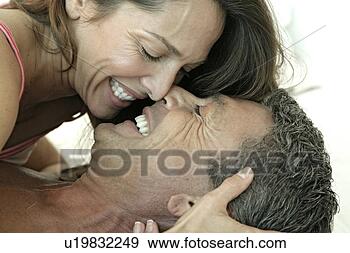 Stock Photograph - view of a couple 
in a cheerful 
mood. fotosearch 
- search stock 
photos, pictures, 
images, and photo 
clipart
