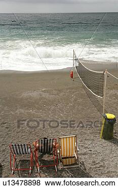 Stock Photo - person relaxing 
on beach, elevated 
view. fotosearch 
- search stock 
photos, pictures, 
images, and photo 
clipart