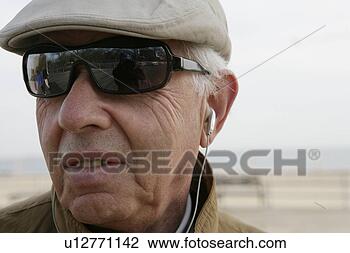 Stock Photo - senior male wearing 
shades. fotosearch 
- search stock 
photos, pictures, 
images, and photo 
clipart