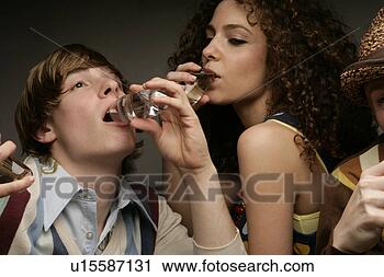 Stock Photography - view of a man 
and woman enjoying 
a drink. fotosearch 
- search stock 
photos, pictures, 
images, and photo 
clipart