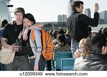 Arquivo Fotográficos - par,  passageiros, 
 bote. fotosearch 
- busca de fotos, 
imagens e clipart