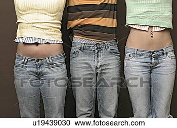 Stock Photography - mid section of 
three teenagers. 
fotosearch - search 
stock photos, 
pictures, images, 
and photo clipart