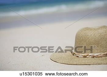Banco de Imagem - close-up,  chapéu, 
 areia. fotosearch 
- busca de fotos, 
imagens e clipart