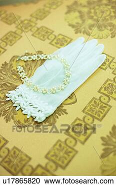 Stock Photography - glove and bracelet. 
fotosearch - search 
stock photos, 
pictures, images, 
and photo clipart