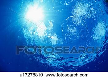 Stock Photography - sunlight into 
water, okinawa, 
japan. fotosearch 
- search stock 
photos, pictures, 
images, and photo 
clipart