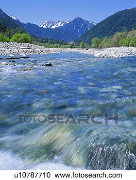 Stock Photography - river between 
mountains. fotosearch 
- search stock 
photos, pictures, 
images, and photo 
clipart