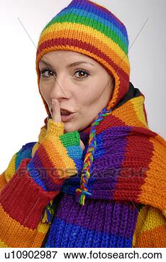 Picture - young woman wearing 
woolen sweater, 
 cap,  scarf and 
gloves in. fotosearch 
- search stock 
photos, pictures, 
images, and photo 
clipart