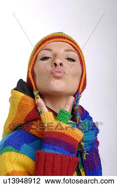 Stock Photo - young woman wearing 
colorful sweater 
with pouting lips. 
fotosearch - search 
stock photos, 
pictures, images, 
and photo clipart