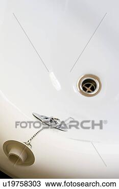 Stock Photo - vintage bathtub 
drain and plug. 
fotosearch - search 
stock photos, 
pictures, images, 
and photo clipart