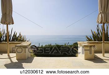 Stock Photo - porch with ocean 
view. fotosearch 
- search stock 
photos, pictures, 
images, and photo 
clipart