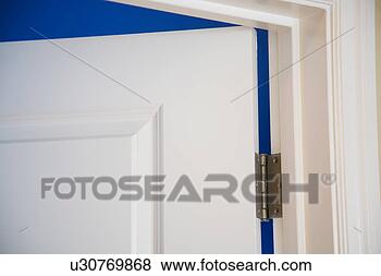Stock Photo - traditional white 
door and blue 
wall. fotosearch 
- search stock 
photos, pictures, 
images, and photo 
clipart