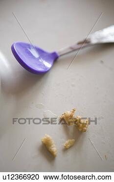 Stock Photography - detail of dirty 
high chair tray 
with baby spoon. 
fotosearch - search 
stock photos, 
pictures, images, 
and photo clipart