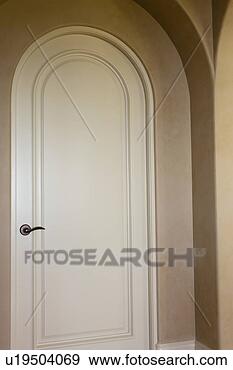 Stock Photograph - closed arched 
door. fotosearch 
- search stock 
photos, pictures, 
images, and photo 
clipart