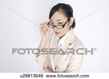 Stock Photo - business lady 
wearing glasses. 
fotosearch - search 
stock photos, 
pictures, images, 
and photo clipart