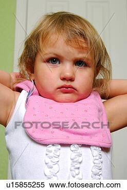 Stock Image - portrait of a 
girl wearing a 
baby bib. fotosearch 
- search stock 
photos, pictures, 
images, and photo 
clipart