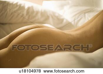 Stock Photo - nude caucasian 
mid-adult female 
back and buttocks 
surrounded by. 
fotosearch - search 
stock photos, 
pictures, images, 
and photo clipart
