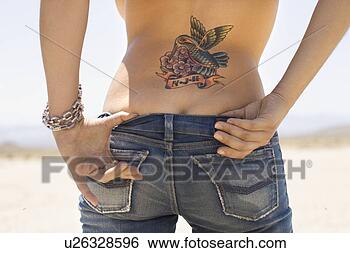 Stock Photo - rear view of torso 
and derriere of 
caucasian mid-adult 
woman with. fotosearch 
- search stock 
photos, pictures, 
images, and photo 
clipart